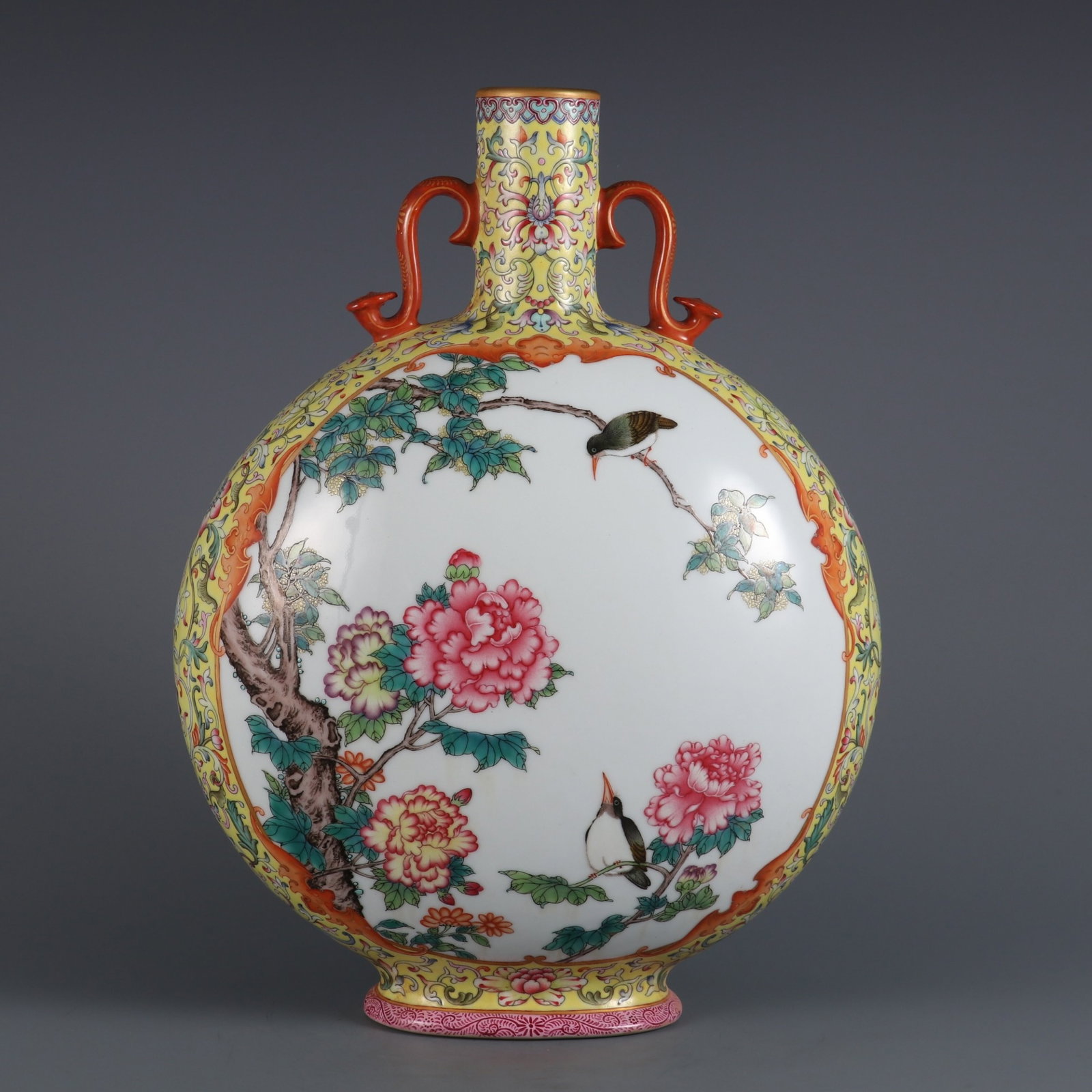 A Rare Yellow Ground Famille-Rose Flower and Bird Pattern Double-Ears Vase: A Rare Yellow Ground Famille-Rose Flower and Bird Pattern Double-Ears Vase,Qing Dynasty,China,Qianlong Six-character Mark,Size:13.3inx10.2in