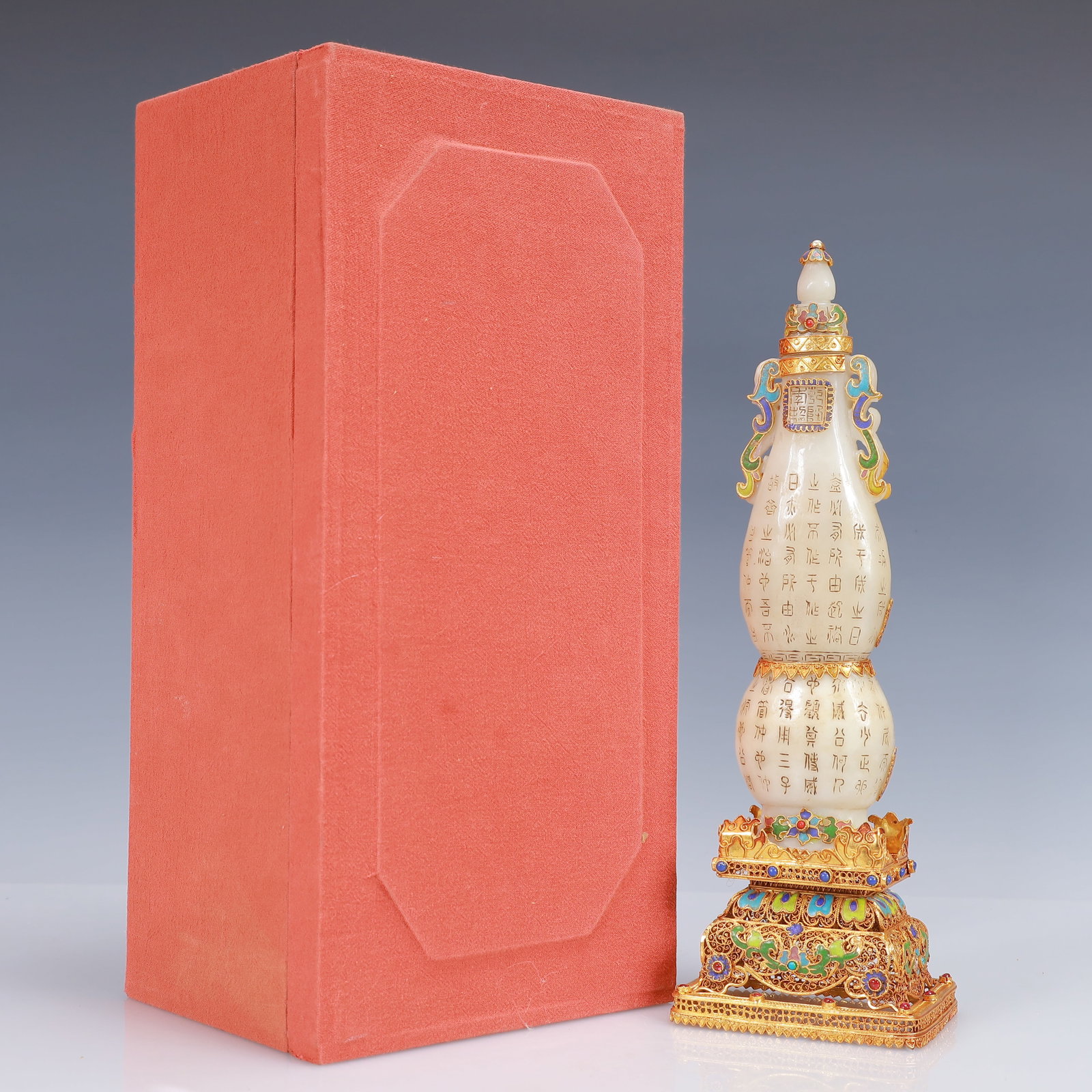 An Exquisite Filigree and Gilding Inlaid White Jade Poem Double-Ears Vase,Inlaid Gems: An Exquisite Filigree and Gilding Inlaid White Jade Poem Double-Ears Vase,Inlaid Gems,Qing Dynasty, China,Qianlong Four-Character Mark,Size:3.9inx3.1inx12.6in,(Box)14.4inx6.9inx5.9in,Weight:700g