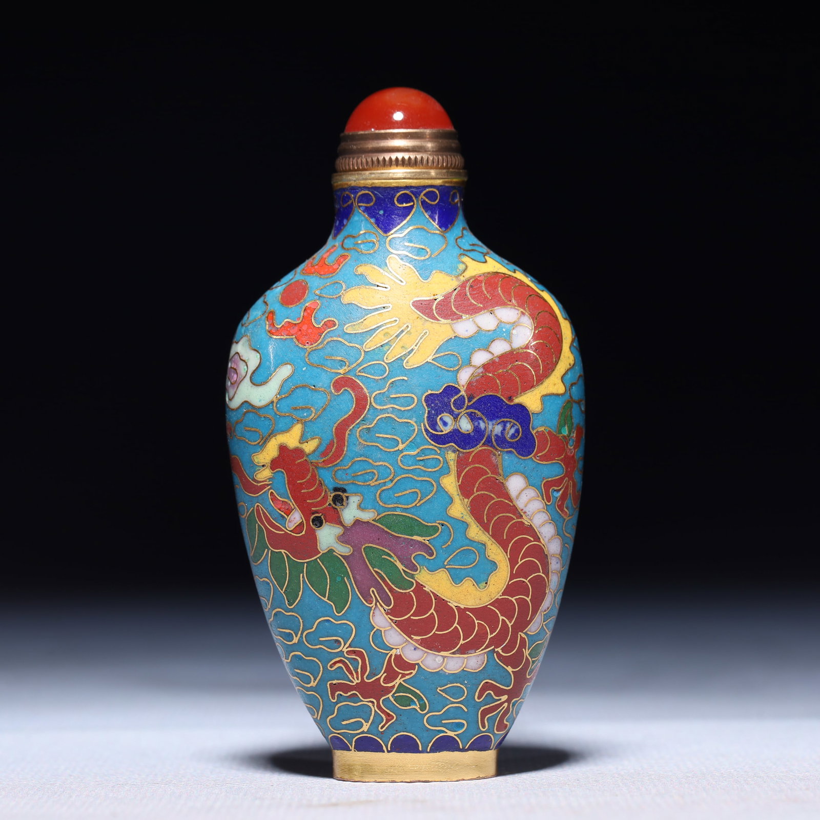 An Exquisite Cloisonne Auspicious Cloud and Dragon Pattern Snuff Bottle: An Exquisite Cloisonne Auspicious Cloud and Dragon Pattern Snuff Bottle,Qing Dynasty,China,Size:1.6inx0.8inx3.3in,Weight:69.2g