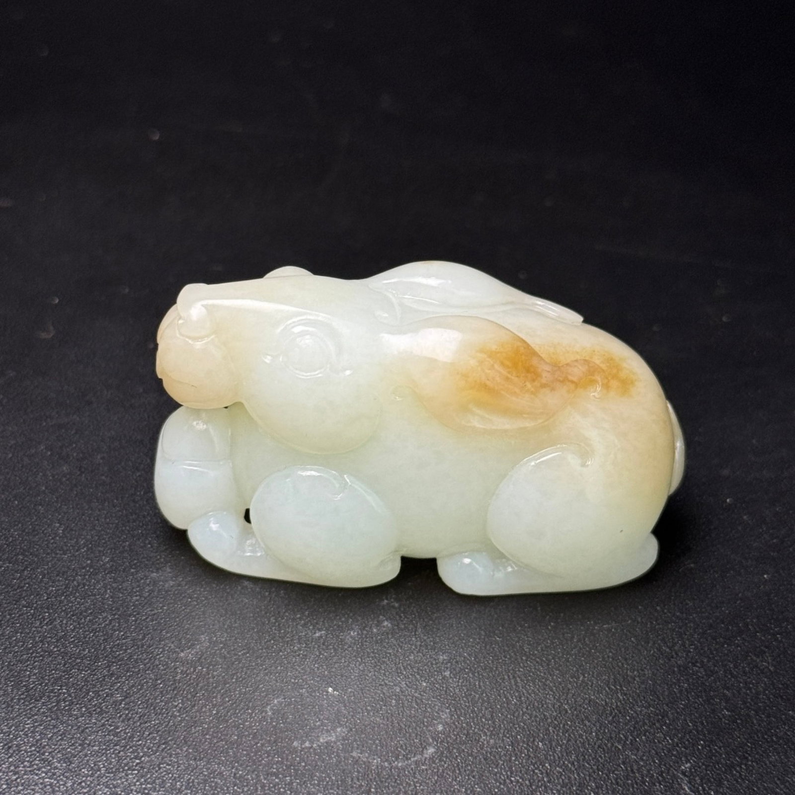 An Exquisite White Jade Rabbit Ornament: An Exquisite White Jade Rabbit Ornament,Qing Dynasty,China,Size:2.3inx1.3inx1.1in,Weight:85g 白玉兔子摆件,中国清代