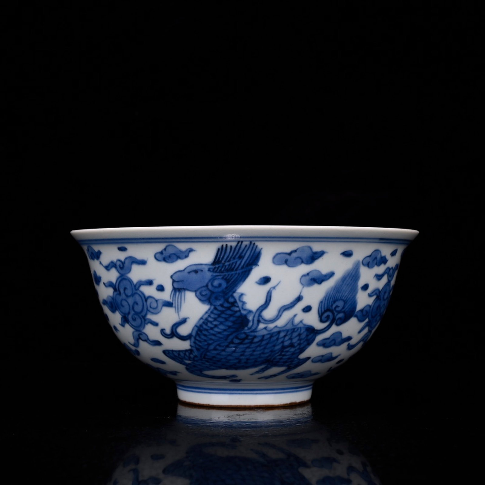 An Exquisite Blue and White Auspicious Cloud and Beast Pattern Bowl: An Exquisite Blue and White Auspicious Cloud and Beast Pattern Bowl,Ming Dynasty,China,Size:3inx6.1in 青花祥云兽纹碗,中国明代
