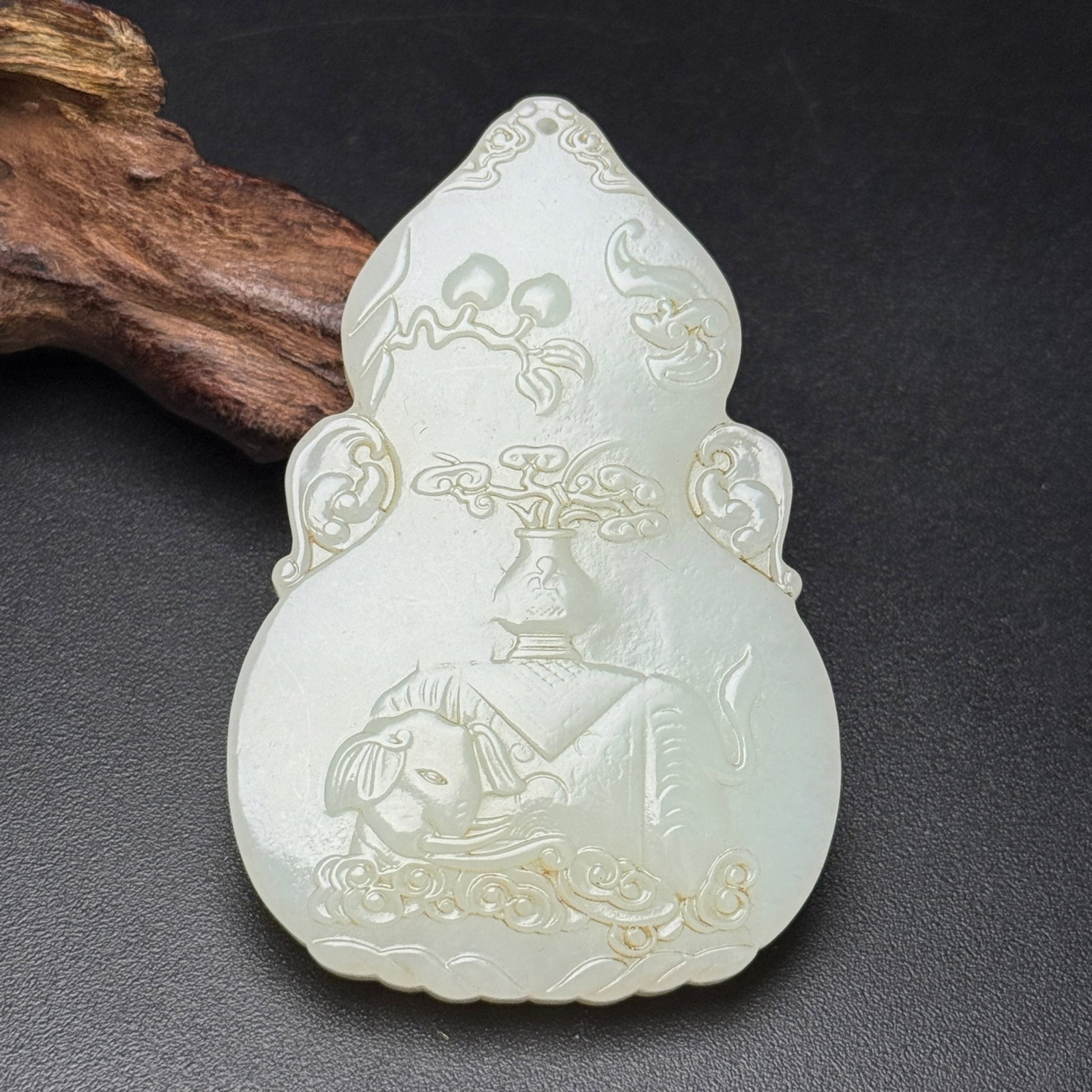 An Exquisite White Jade Elephant Pattern Pendant (1 of 7)
