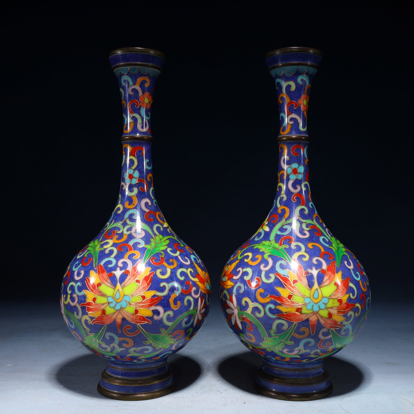 A Pair of Exquisite Cloisonne Lotus Pattern Vases: A Pair of Exquisite Cloisonne Lotus Pattern Vases,Qing Dynasty,China,Qianlong Four-character Mark,Size:10.6inx4.7inx4.7in,Weight:2350g