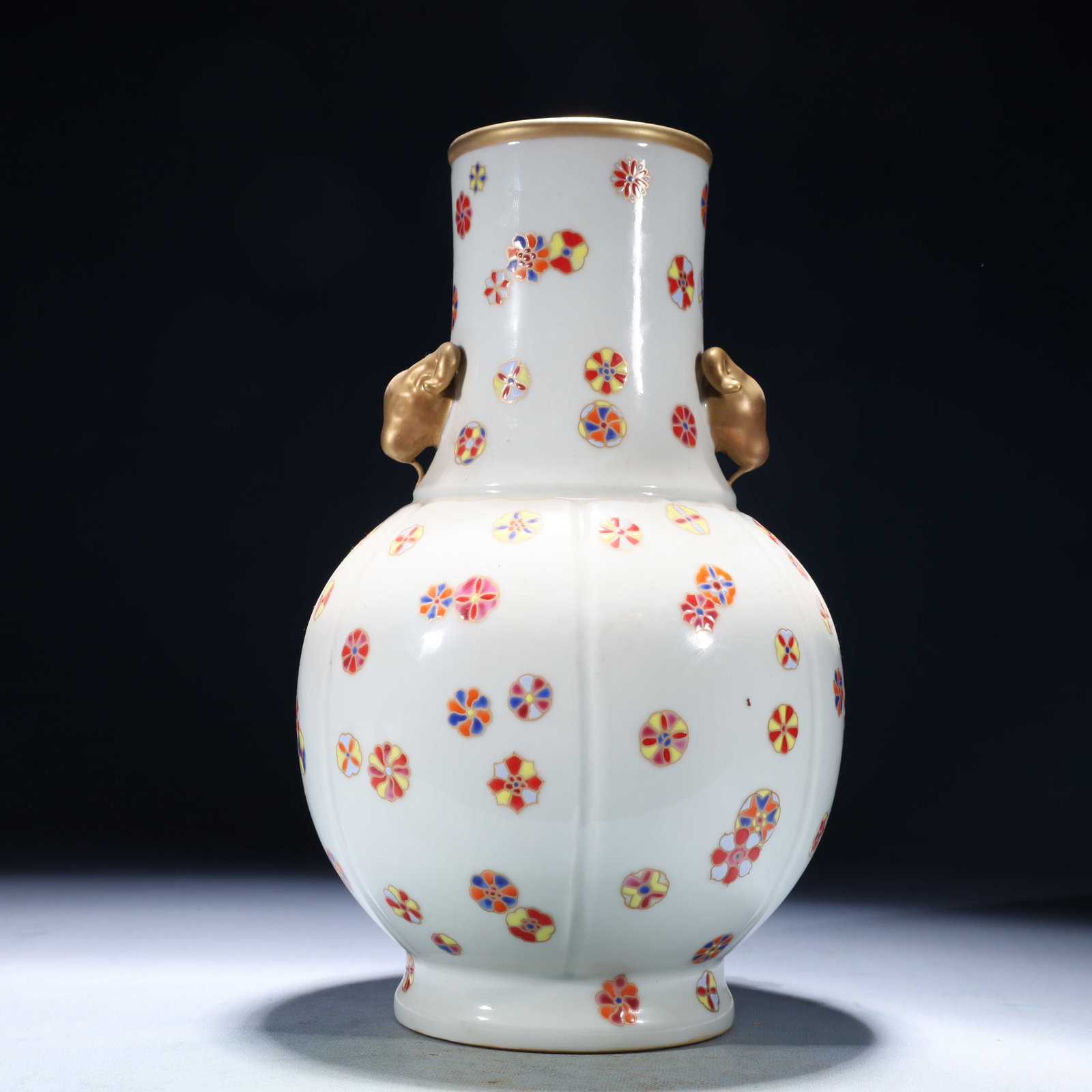 An Exquisite Famille-Rose Painted Gold Flower Pattern Beast-Ears Vase: An Exquisite Famille-Rose Painted Gold Flower Pattern Beast-Ears Vase,Qing Dynasty,China,Qianlong Four-character Mark,Size:6.7inx11.8in,Weight:2000g 粉彩描金花卉