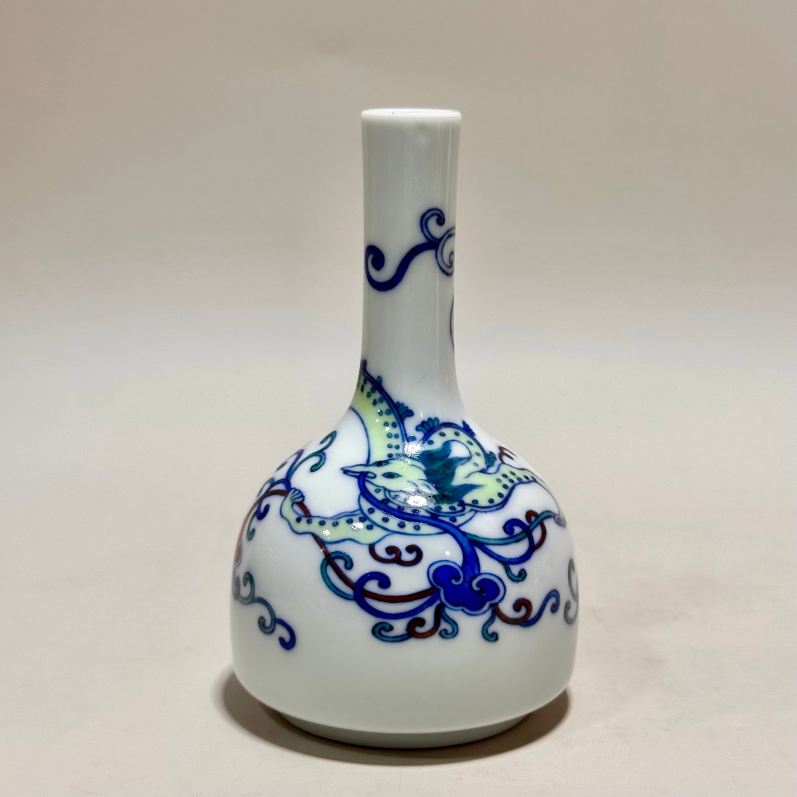 An Exquisite Doucai Flower and Dragon Pattern Vase: An Exquisite Doucai Flower and Dragon Pattern Vase,Qing Dynasty,China,Yongzheng Six-character Mark,Size:4.6inx2.8in