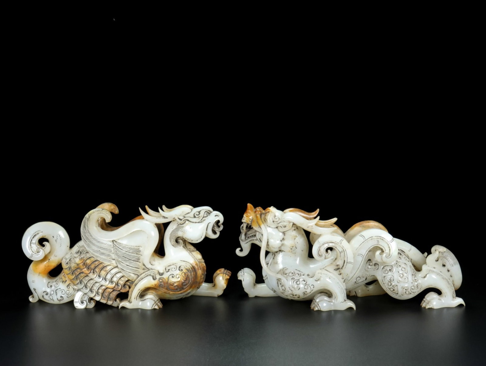 A Pair of Archaic Gaogu yu Dragon and Phoenix Ornament: A Pair of Archaic Gaogu yu Dragon and Phoenix Ornament,Ancient Time, China, Size:Dragon:7.9inx2.4inx3.5in,Phoenix:7.5inx2.4inx3.5in, Weight:1990g 一对高古玉龙࠰