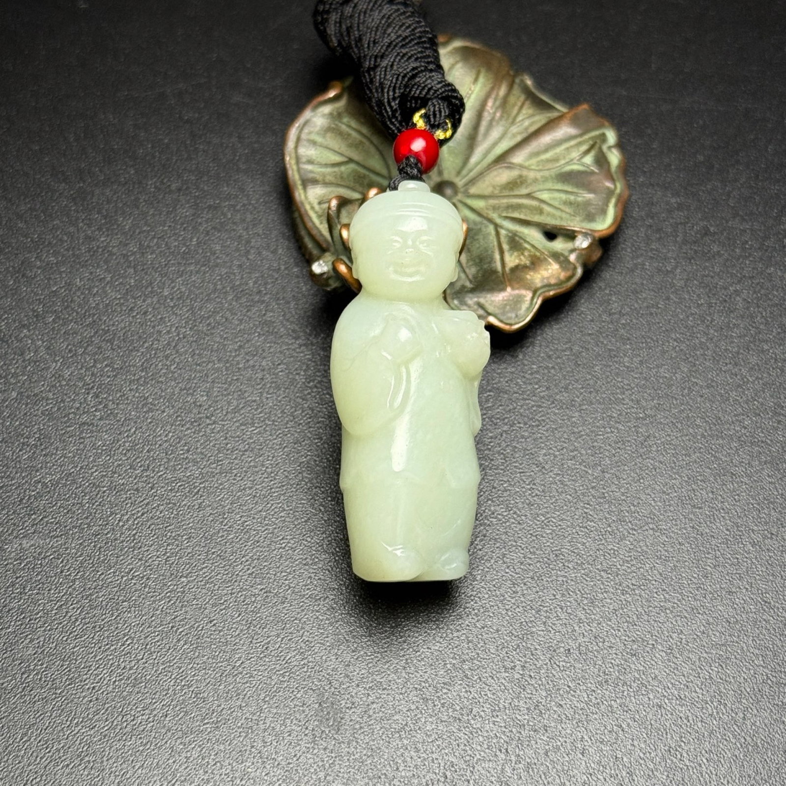 An Exquisite White Jade Figure Pendant: An Exquisite White Jade Figure Pendant,Qing Dynasty, China,Size:2inx0.7inx0.7in,Weight:31g 白玉人物挂件,中国清代