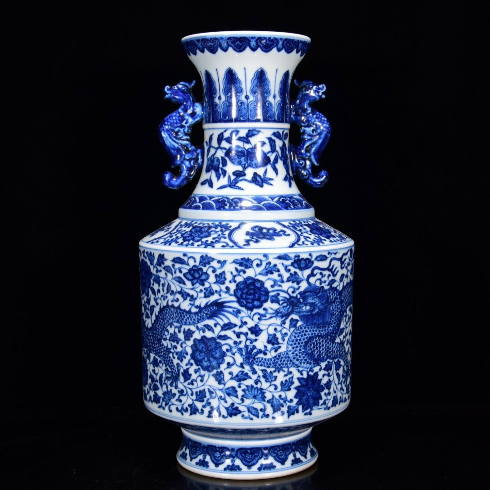 A Rare Blue and White Lotus and Dragon Pattern Double-Ears Vase: A Rare Blue and White Lotus and Dragon Pattern Double-Ears Vase,Qing Dynasty,China,Qianlong Six-character Mark,Size:13inx6.7in 青花缠枝莲龙纹双耳&