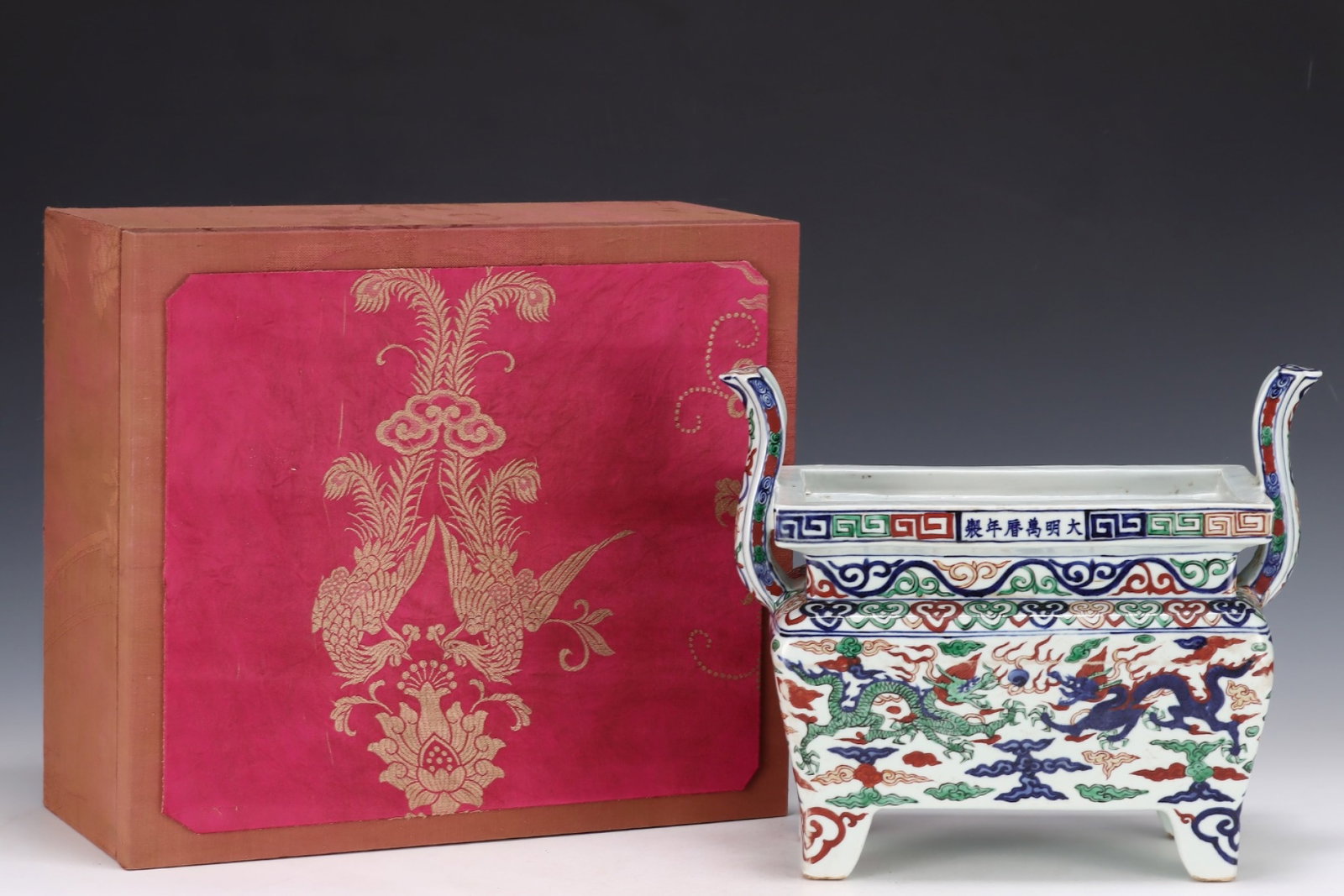 A Rare Blue and White Wucai Auspicious Cloud and Dragon Pattern Double-Ears four legs Censer: A Rare Blue and White Wucai Auspicious Cloud and Dragon Pattern Double-Ears four legs Censer,Ming Dynasty,China,Wanli Six-character Mark,Size:10.9inx12.2in 青花五彩祥