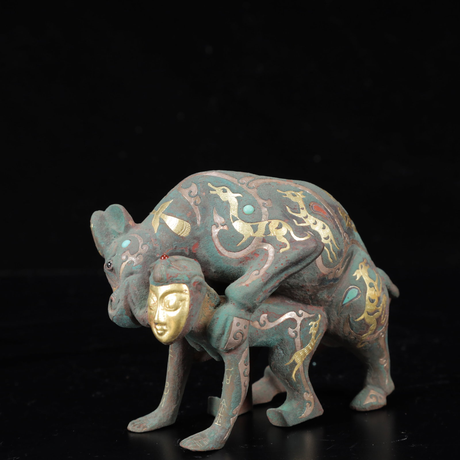 An Archaic Bronze Inlaid Gold and Silver Figure Buffalo Ornament,Inlaid Gems: An Archaic Bronze Inlaid Gold and Silver Figure Buffalo Ornament,Inlaid Gems,The Warring States period in China,Size:5.1inx2inx3.7in,Weight:800g