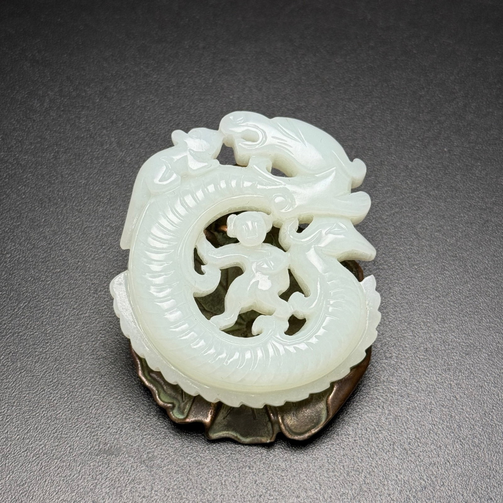An Exquisite White Jade Figure and Dragon Pattern Pendant (1 of 7)