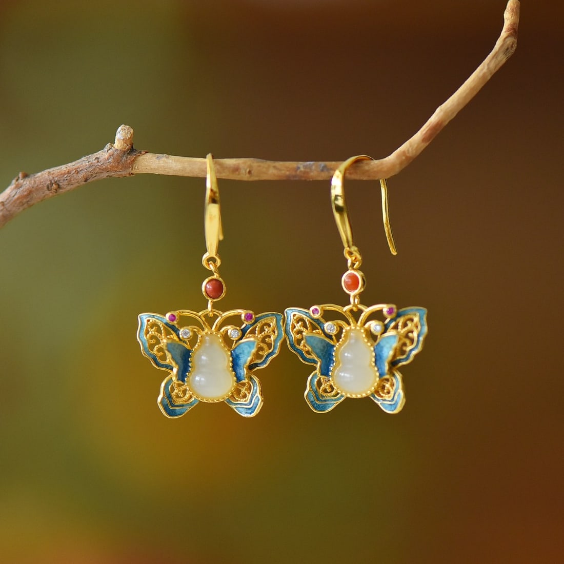A Pair of Exquisite Sterling Silver Inlaid White Jade Butterfly Pattern Earrings: A Pair of Exquisite Sterling Silver Inlaid White Jade Butterfly Pattern Earrings,Size:0.2inx0.3in 一对纯银镶白玉蝴蝶纹耳环