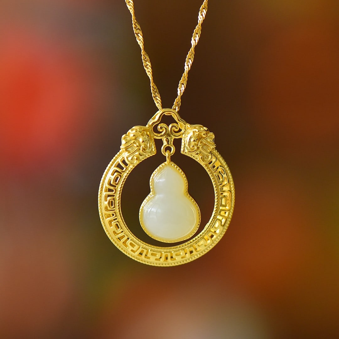 An Exquisite Sterling Silver-Gold Plated Inlaid White Jade Pendant: An Exquisite Sterling Silver-Gold Plated Inlaid White Jade Pendant 纯银镀金镶白玉吊坠