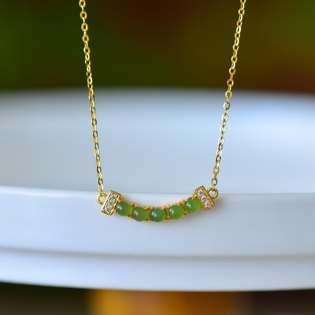 An Exquisite Sterling Silver-Gold Plated Inlaid White Jade Pendant: An Exquisite Sterling Silver-Gold Plated Inlaid White Jade Pendant,Size:0.1inx0.1in 纯银镀金镶白玉吊坠
