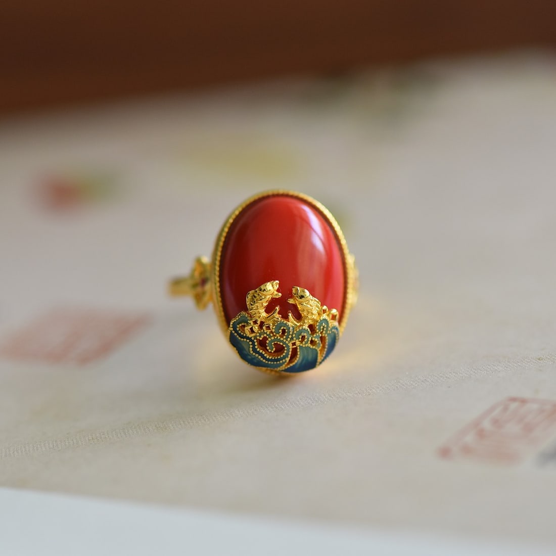 An Exquisite Sterling Silver-Gold Plated Inlaid Cinnabar Ring: An Exquisite Sterling Silver-Gold Plated Inlaid Cinnabar Ring,Size:0.5inx0.7in 寓意:鱼跃龙门、年年有余