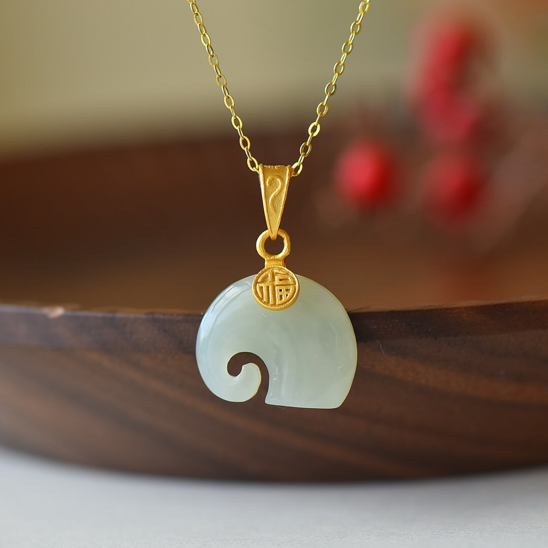 An Exquisite Sterling Silver-Gold Plated Inlaid White Jade Pendant: An Exquisite Sterling Silver-Gold Plated Inlaid White Jade Pendant 纯银镀金镶白玉吊坠