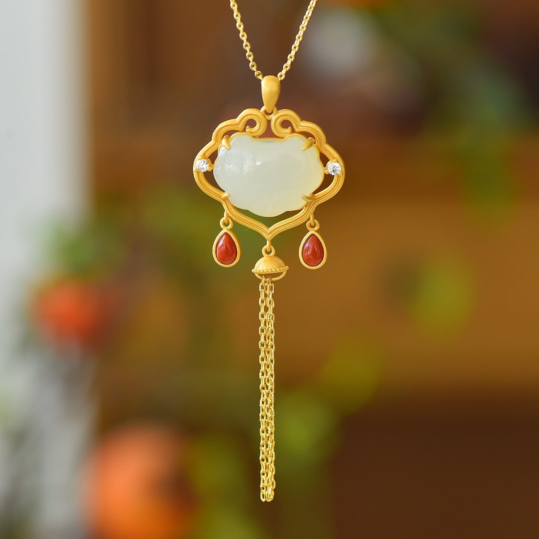 An Exquisite Sterling Silver-Gold Plated Inlaid White Jade Pendant: An Exquisite Sterling Silver-Gold Plated Inlaid White Jade Pendant 纯银镀金镶白玉吊坠