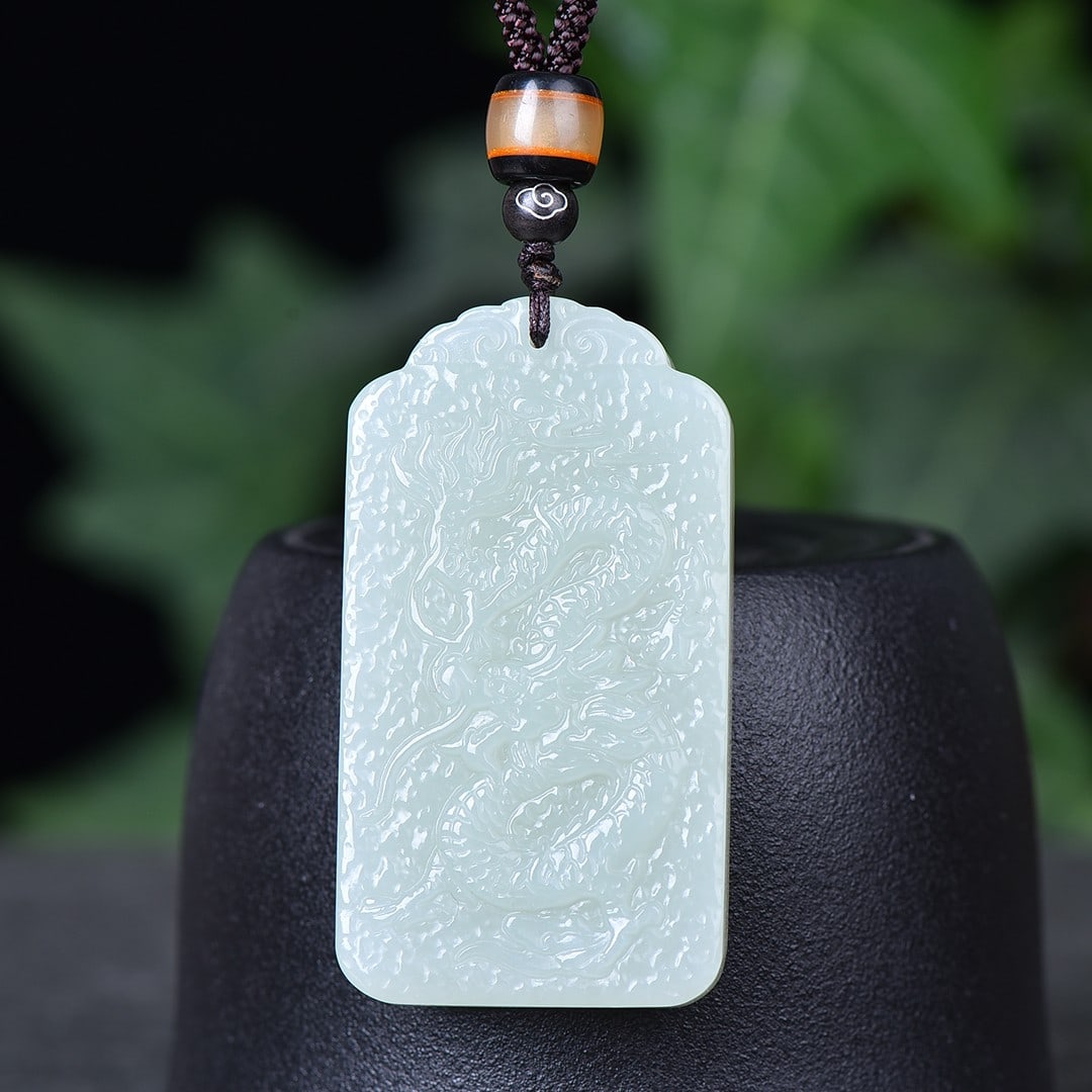 An Exquisite White Jade Dragon Pattern Pendant: An Exquisite White Jade Dragon Pattern Pendant,Size:1.2inx2.4in 白玉龙纹挂件