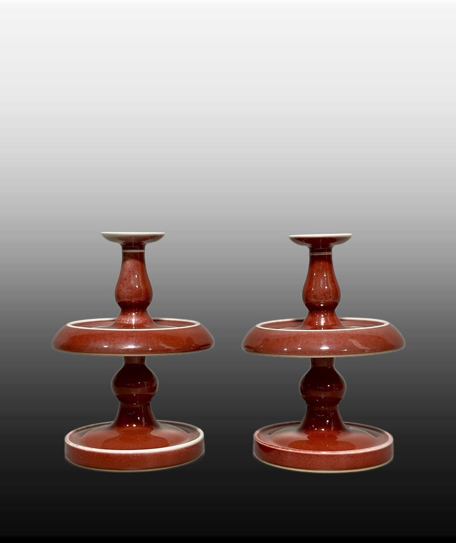 A pair of Exquisite Ji Red Glazed Candlestick: A pair of Exquisite Ji Red Glazed Candlestick,Qing Dynasty, China,Qianlong Six-character Mark,Size:6.2inx1.8inx4.3inx3.7in