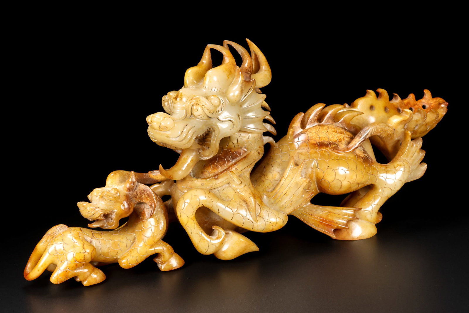 A Exquisite Hotan Jade Kylin Ornament: A Exquisite Hotan Jade Kylin Ornament,Han Dynasty, China,Size:15inx3.1inx6.3in,Weight:2269g 和田玉麒麟摆件,中国汉代