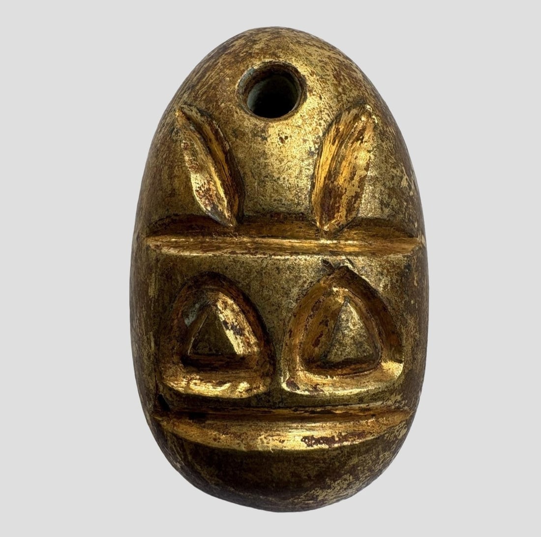 A Exquisite Gilt Bronze Coin: A Exquisite Gilt Bronze Coin,Han Dynasty, China,Size:1.3inx0.8in,Weight:30g 铜鎏金鬼脸金钱,中国汉代