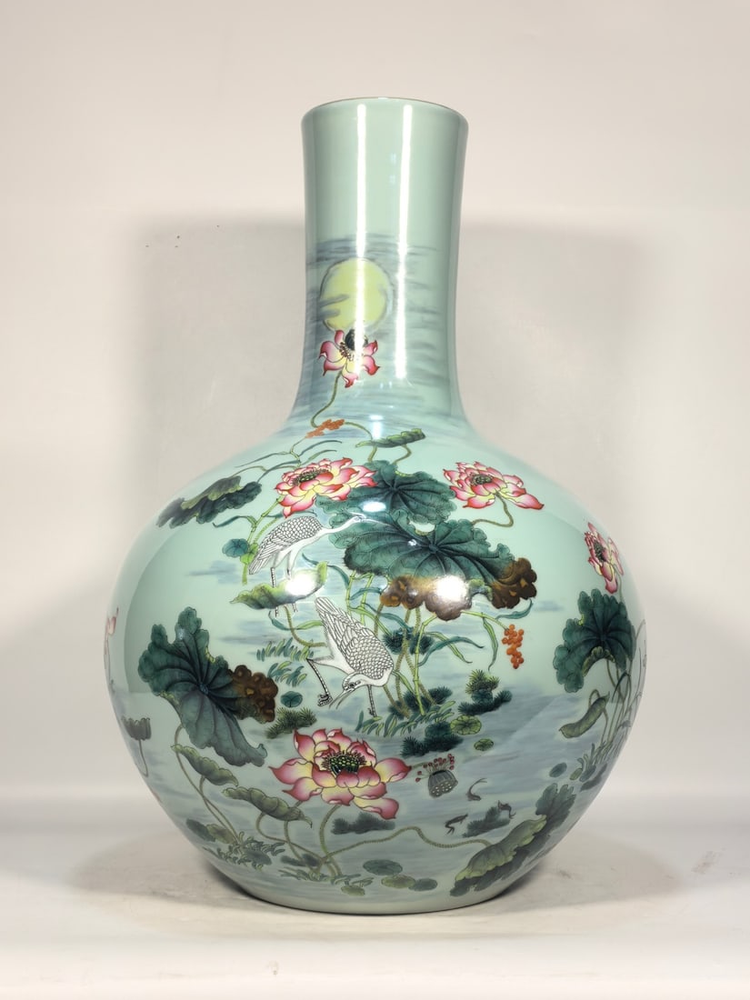 A Exquisite Enamel Sky Blue Glazed Lotus Pattern Vase: A Exquisite Enamel Sky Blue Glazed Lotus Pattern Vase,Qing Dynasty, China,Qianlong Six-character Mark,Size:21.7inx4.7inx15inx7.5in