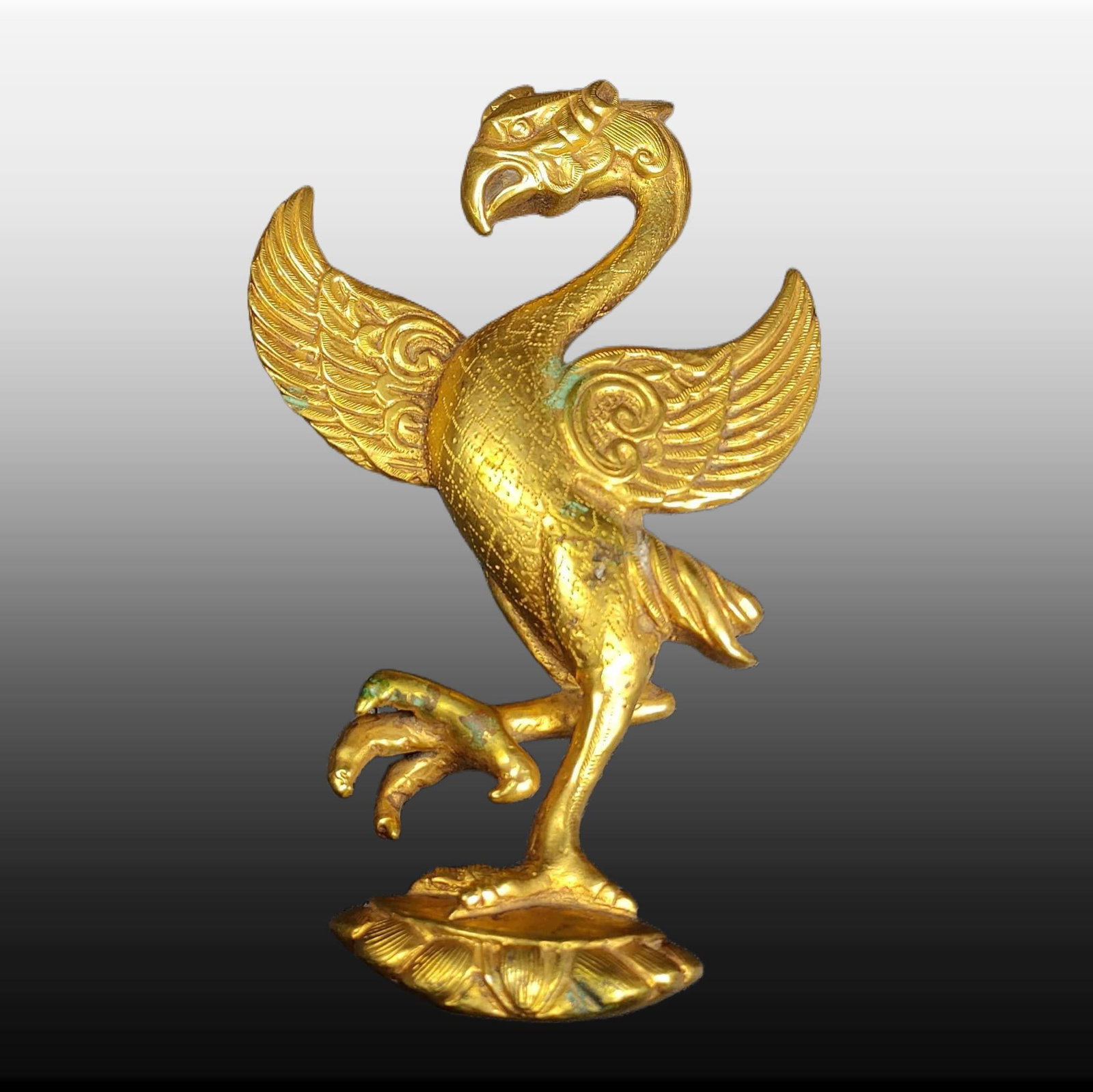 A Exquisite Gilt Bronze Phoenix Ornament: A Exquisite Gilt Bronze Phoenix Ornament,Han Dynasty, China,Size:5.5inx3.5in,Weight:384g 铜鎏金凤凰摆件,中国汉代