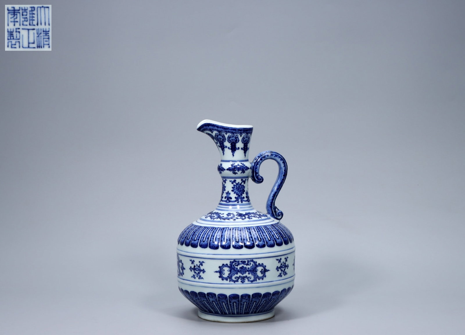 A Exquisite Blue and White Flower Pattern Ewer: A Exquisite Blue and White Flower Pattern Ewer,Qing Dynasty, China,Yongzheng Six-character Mark,Size:10.2inx5.7inx1.8inx3.9in,Weight:1353g