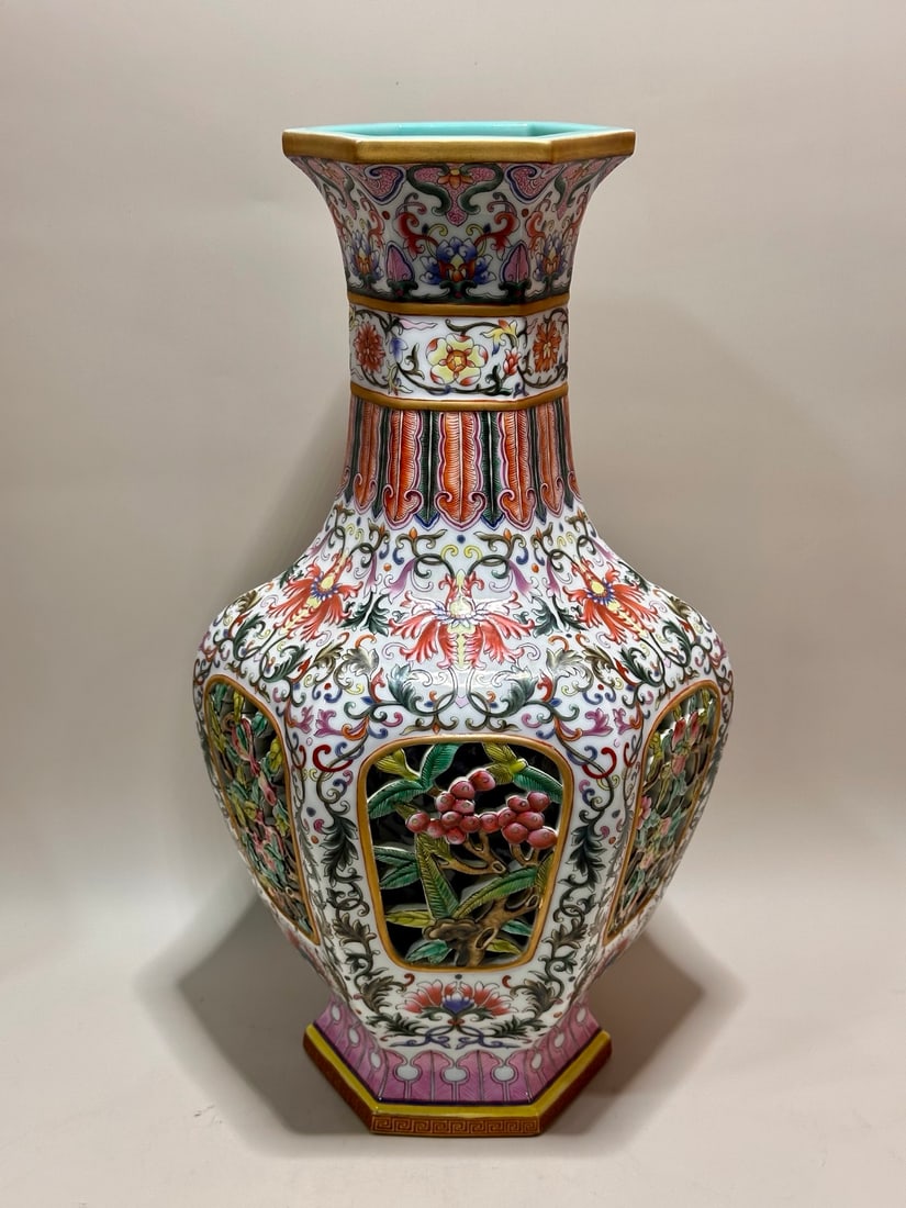 A Exquisite Enamel Flower and Fruit Pattern Vase: A Exquisite Enamel Flower and Fruit Pattern Vase,Qing Dynasty, China,Qianlong Six-character Mark,Size:15.7inx5.2inx5.3in