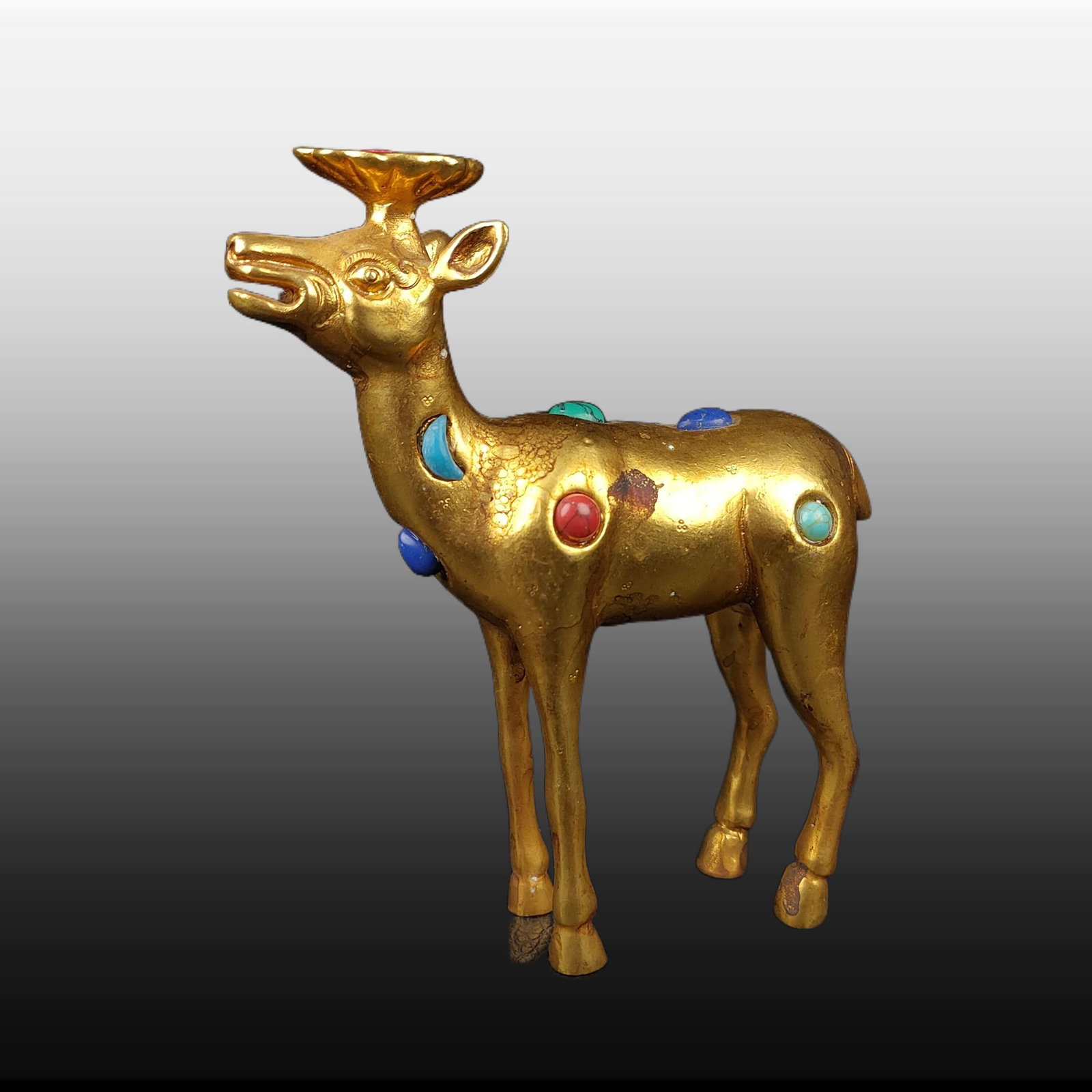 A Exquisite Gilt Bronze Inlaid Gems Sika Deer-shaped Ornament: A Exquisite Gilt Bronze Inlaid Gems Sika Deer-shaped Ornament,Tang Dynasty, China,Size:4.3inx3.1in,Weight:379g