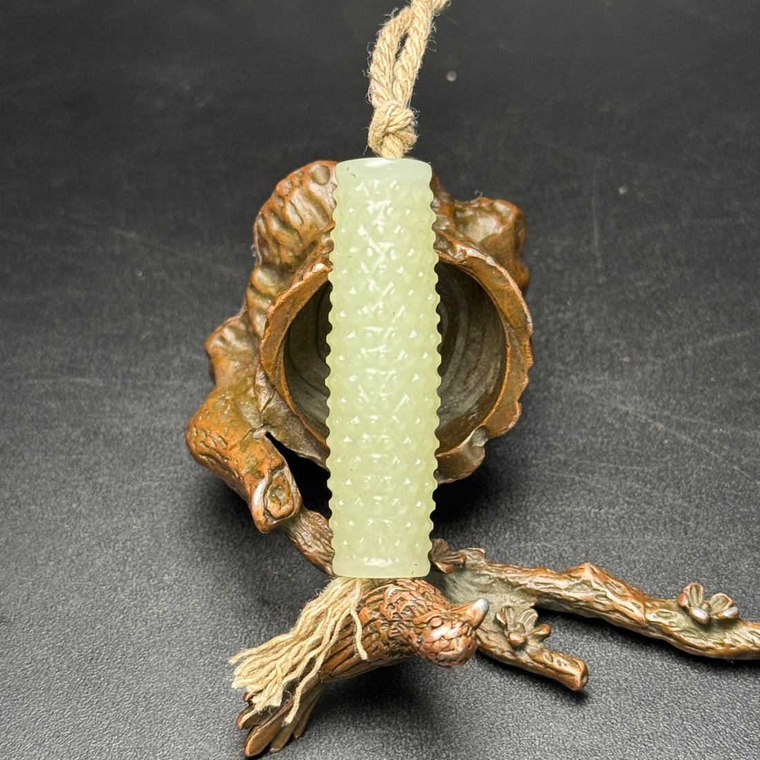 A Exquisite Hotan Jade Nail Pattern Pendant: A Exquisite Hotan Jade Nail Pattern Pendant,Qing Dynasty, China,Size:2inx0.6inx0.5in,Weight:17g 和田玉乳钉纹挂件,中国清代
