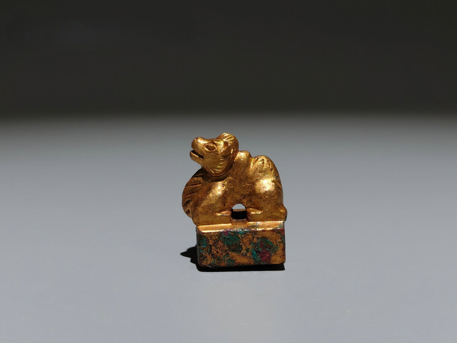 A Exquisite Gilt Bronze Camel Seal: A Exquisite Gilt Bronze Camel Seal,Han Dynasty, China,Size:1.4inx1.1inx0.9in,Weight:g 铜鎏金骆驼印章,中国汉代