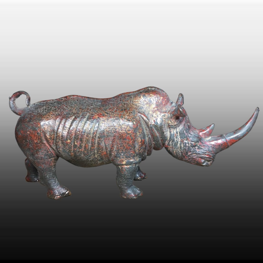 A Exquisite Copper Rhinoceros Ornament: A Exquisite Copper Rhinoceros Ornament,Ming Dynasty, China,Size:9.4inx3.1in,Weight:1300g 铜犀牛摆件,中国明代