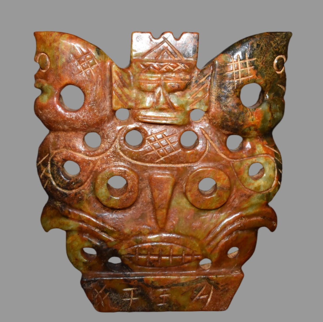 A Exquisite Hemoyu Facial Mask: A Exquisite Hemoyu Facial Mask,Ancient Time, China,Size:9.4inx10in,Weight:2540g 河磨玉脸谱,远古时期