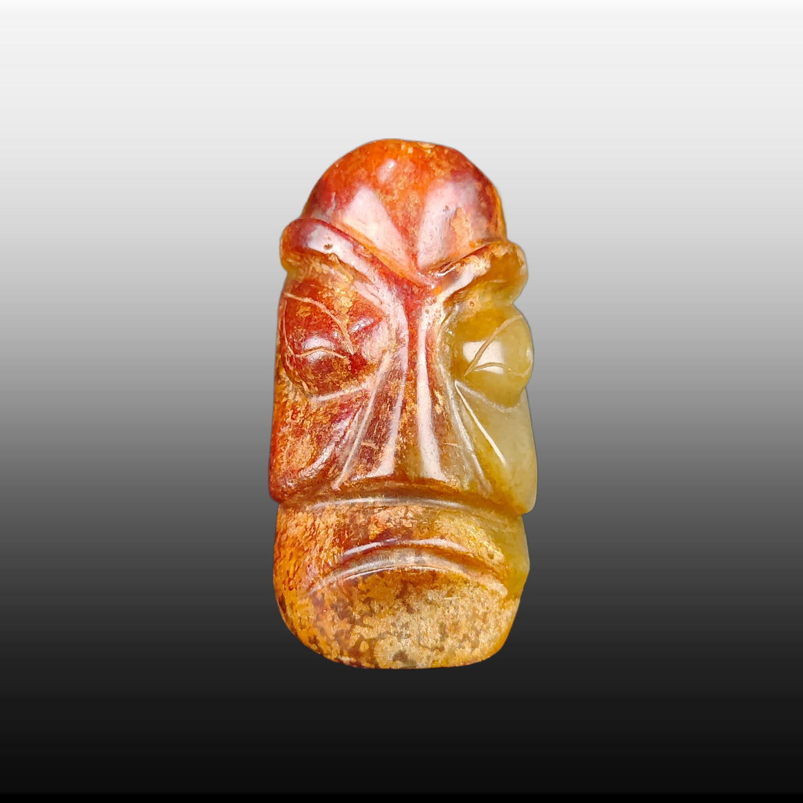 A Exquisite Gaogu Jade Sun God Ornament: A Exquisite Gaogu Jade Sun God Ornament,Ancient Time, China,Size:2.8inx2in,Weight:275g 高古玉太阳神摆件,远古时期
