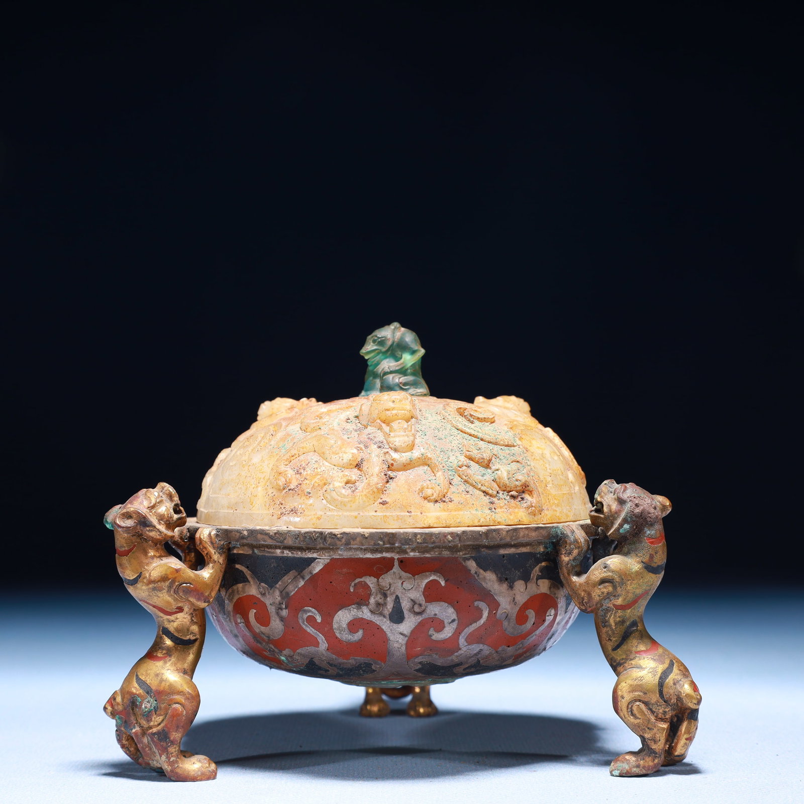 An Exquisite Bronze Inlaid Gold and Silver Inlaid White Jade Chi-Dragon Pattern Tripod Censer: An Exquisite Bronze Inlaid Gold and Silver Inlaid White Jade Chi-Dragon Pattern Tripod Censer,the Warring States period in China,Size:5.1inx4.7in,Weight:750g 铜错金银嵌&#
