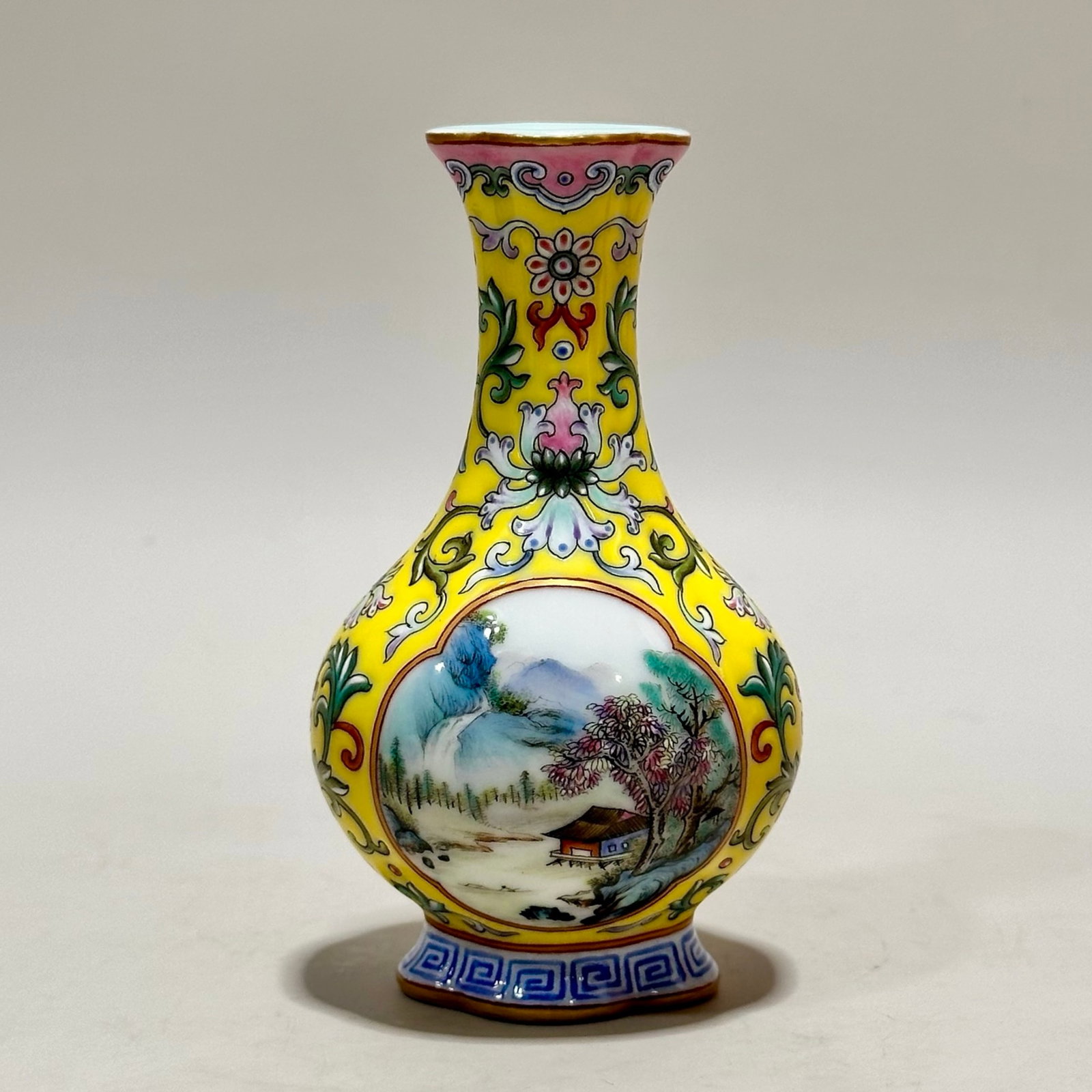 An Exquisite Yellow Ground Enamel Landscape Pattern Vase: An Exquisite Yellow Ground Enamel Landscape Pattern Vase,Qing Dynasty,China,Qianlong Four-character Mark,Size:4.2inx2.4in 黄地珐琅彩山水纹瓶,È