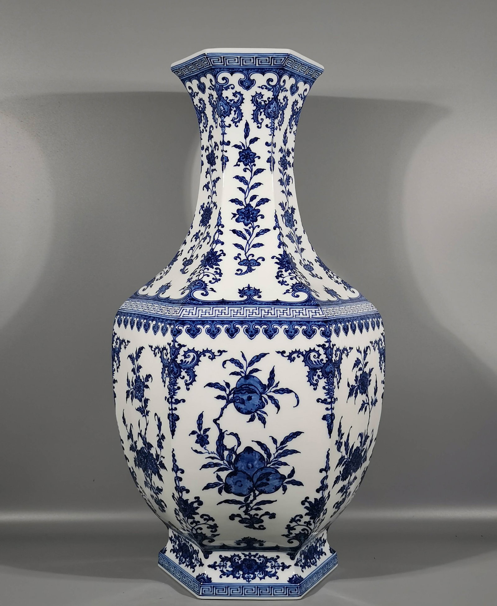 A Huge Blue and White Flower and Fruit Pattern Vase: A Huge Blue and White Flower and Fruit Pattern Vase,Qing Dynasty,China,Qianlong Six-character Mark,Size:25.8inx7.7inx14in 青花花果纹瓶,中国清É