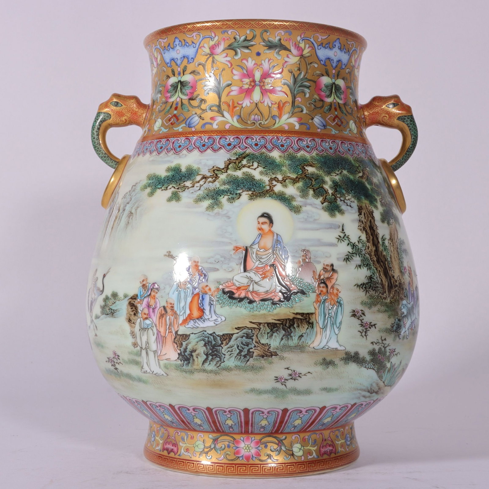 An Exquisite Enamel Gold Ground Landscape and Arhat Pattern Elephant-Ears Vase: An Exquisite Enamel Gold Ground Landscape and Arhat Pattern Elephant-Ears Vase,Qing Dynasty, China,Qianlong Six-character Mark,Size:9.8inx7.5inx5.1inx5in 珐琅彩金地ा