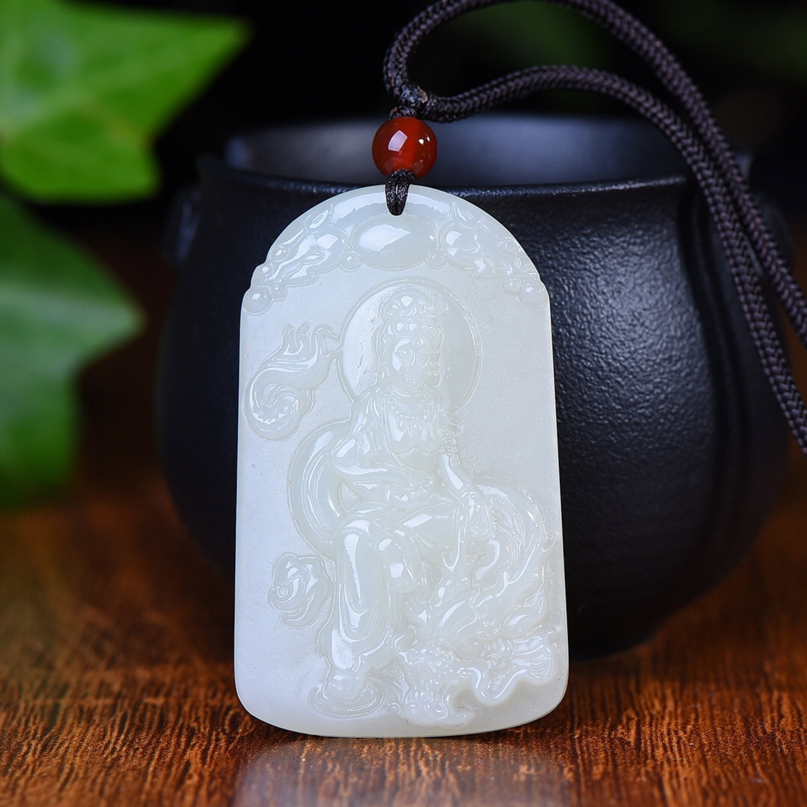 An Exquisite White Jade Avalokitesvara Pattern Pendant (1 of 5)