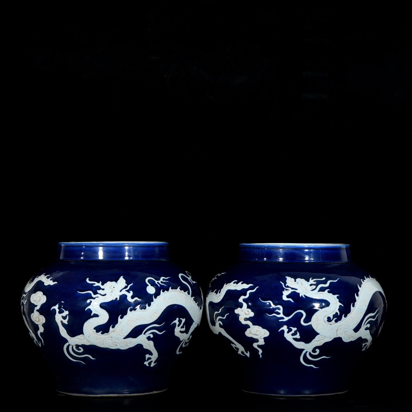 A Pair of Rare Ji Blue Glazed Auspicious Cloud and Dragon Pattern Jars: A Pair of Rare Ji Blue Glazed Auspicious Cloud and Dragon Pattern Jars,Yuan Dynasty,China,Size:11inx14.2in 一对霁蓝釉祥云龙纹罐,中