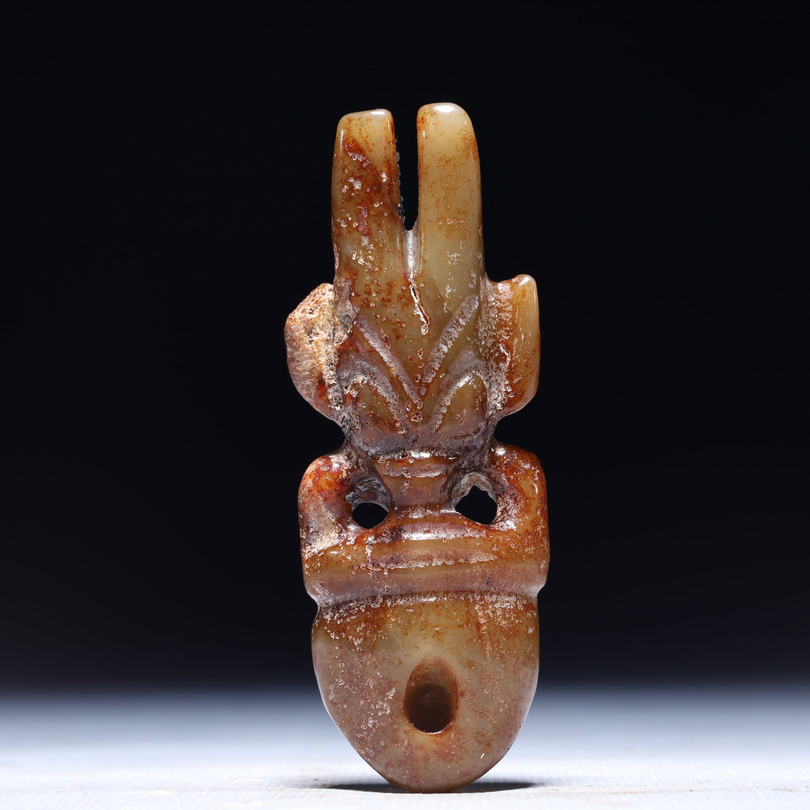 An Archaic Hongshan Culture Yellow Jade Beast-Face Pattern Ornament: An Archaic Hongshan Culture Yellow Jade Beast-Face Pattern Ornament,Ancient Time,China,Size:1.2inx0.5inx3.1in,Weight:43g 红山文化黄玉兽面纹摆