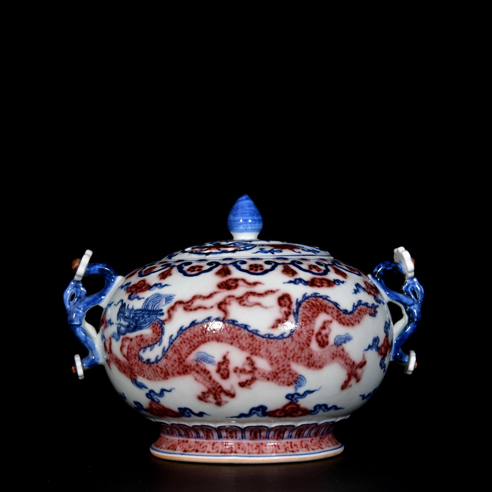 An Exquisite Blue and White Underglaze-Red Auspicious Cloud and Dragon Pattern Ruyi-EarsCover Jar: An Exquisite Blue and White Underglaze-Red Auspicious Cloud and Dragon Pattern Ruyi-EarsCover Jar,Ming Dynasty,China,Xuande Six-character Mark,Size:5.9inx7.9in 青花釉里红