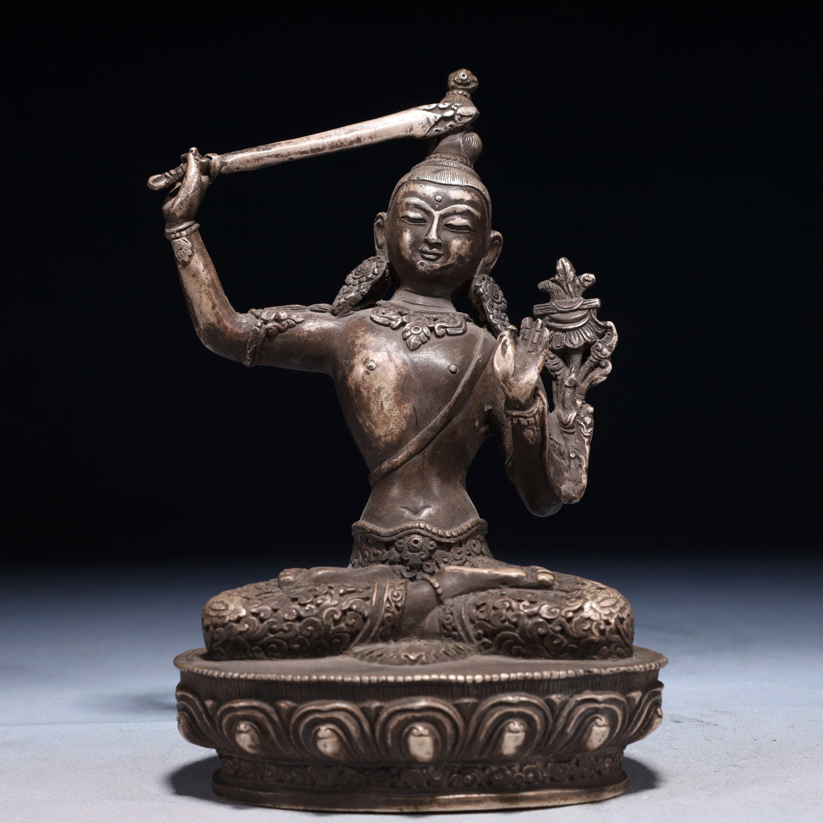 A Solemn Silver-plated Bronze Statue of Manjusri: A Solemn Silver-plated Bronze Statue of Manjusri,Qing Dynasty,China,Size:4.7inx3.1inx7.5in,Weight:650g 铜镀银文殊菩萨像,中国清代
