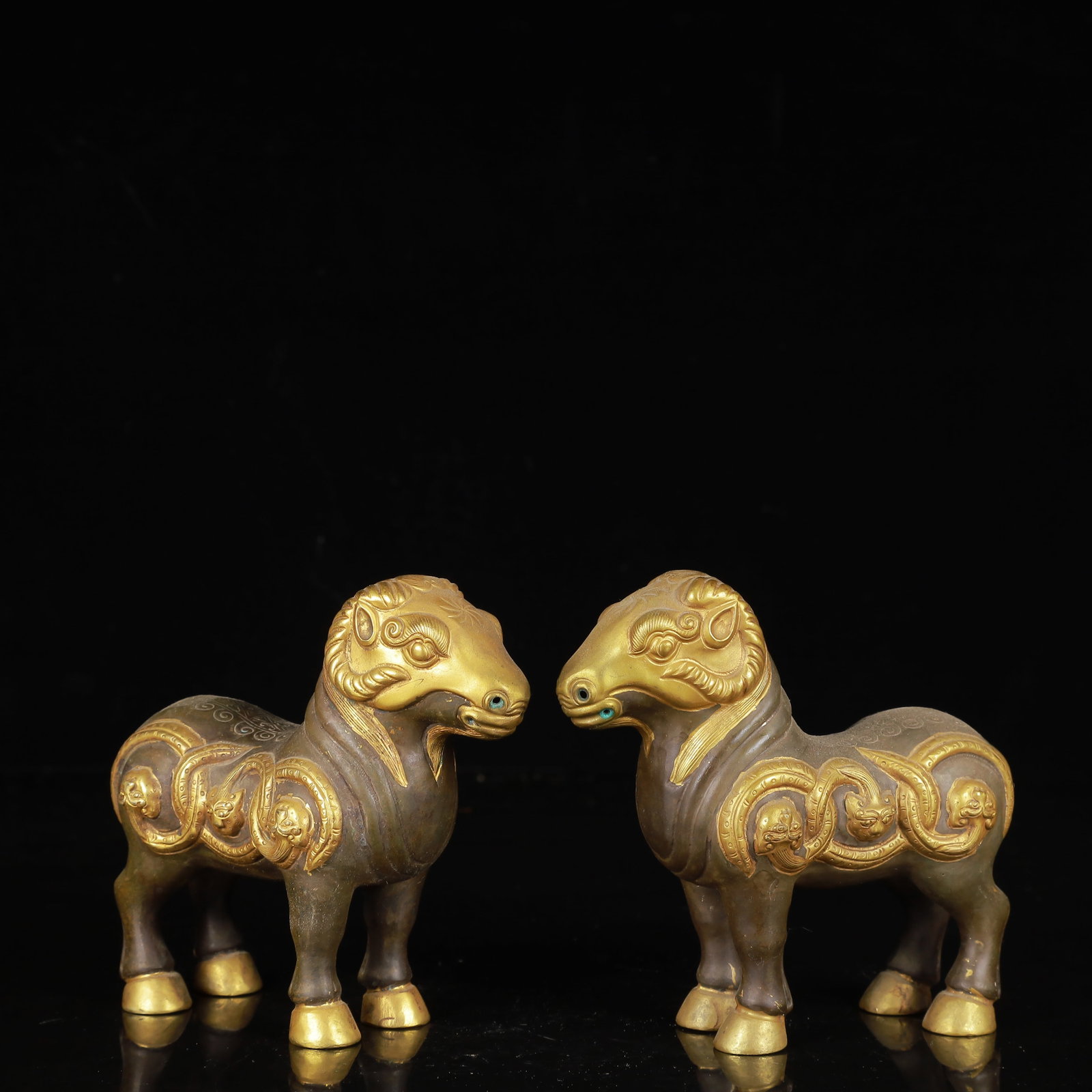A Pair of Exquisite Gilt Silver Sheep Ornaments: A Pair of Exquisite Gilt Silver Sheep Ornaments,Qing Dynasty,China,Size:4.7inx2inx4.3in,Weight:800g 一对银鎏金羊摆件,中国清代