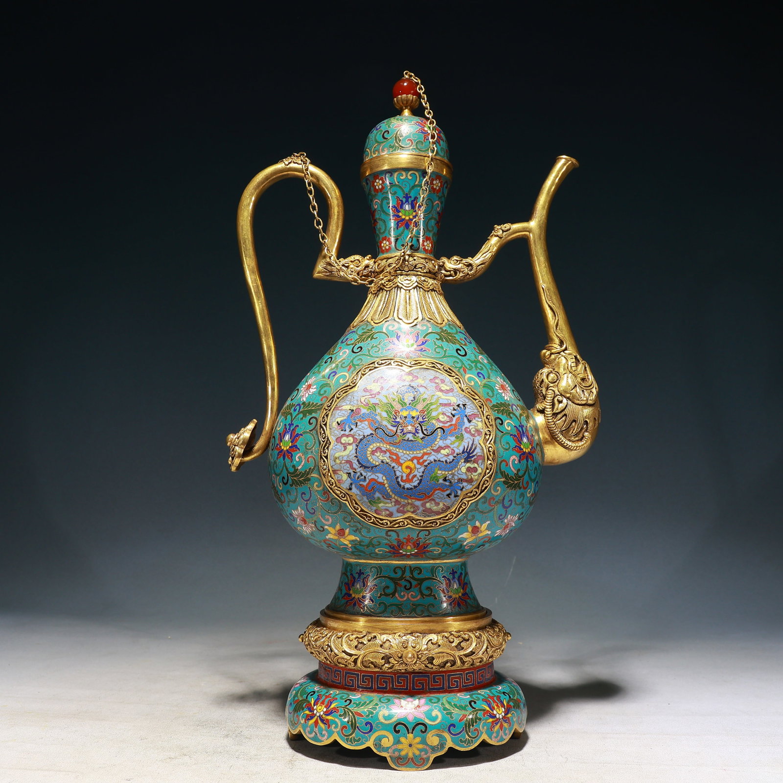 A Huge Cloisonne Lotus,Auspicious Cloud and Dragon Pattern Beast-head Ewer,With Base: A Huge Cloisonne Lotus,Auspicious Cloud and Dragon Pattern Beast-head Ewer,With Base,Qing Dynasty, China,Kangxi Four-character Mark,Size:9.8inx5.9inx20.1in,Weight:6350g 景泰蓝缠