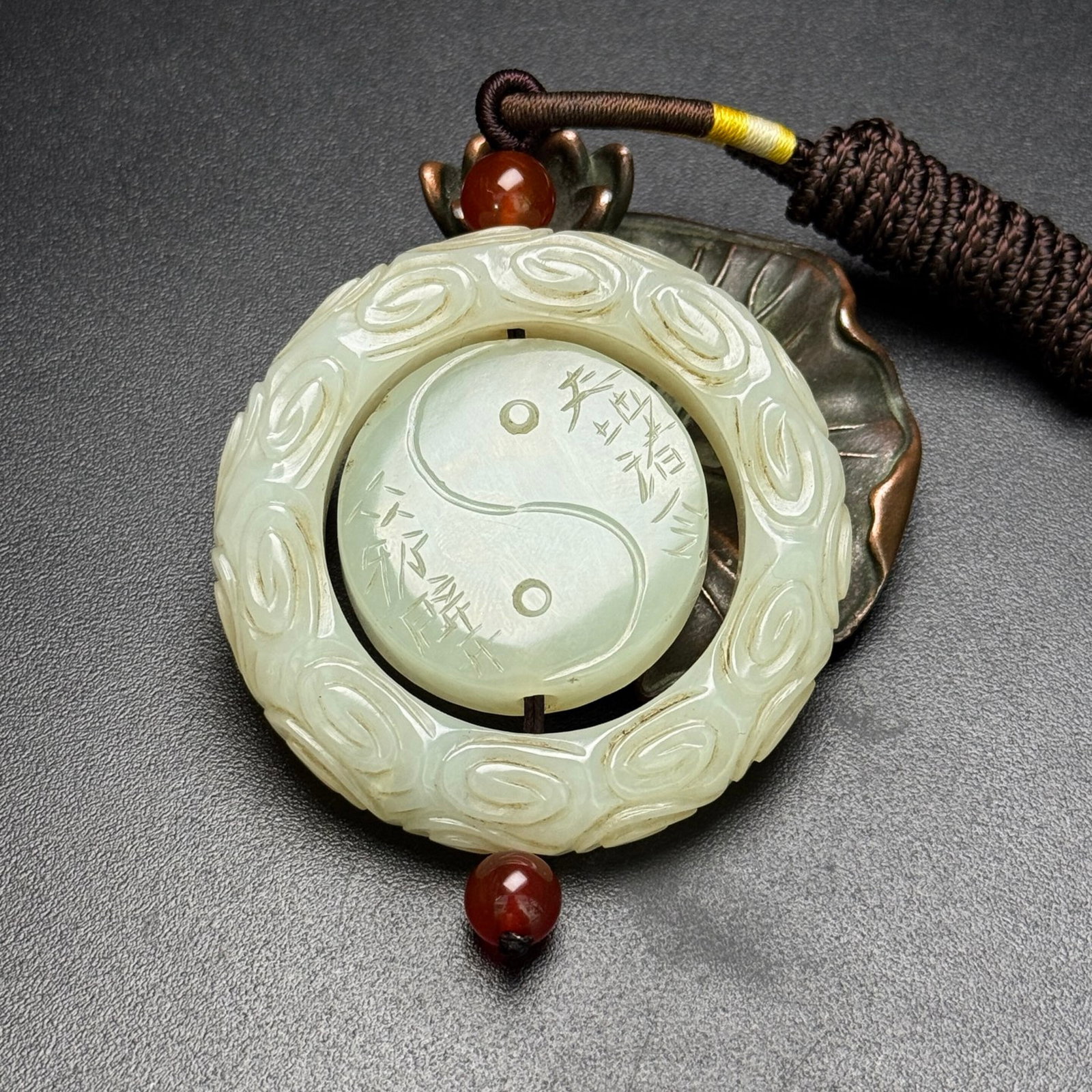 An Exquisite White Jade Auspicious Cloud and Trigram Pattern Pendant: An Exquisite White Jade Auspicious Cloud and Trigram Pattern Pendant,Qing Dynasty,China,Size:54mmx10mm,Weight:55g 白玉祥云八卦纹挂件,中Þ