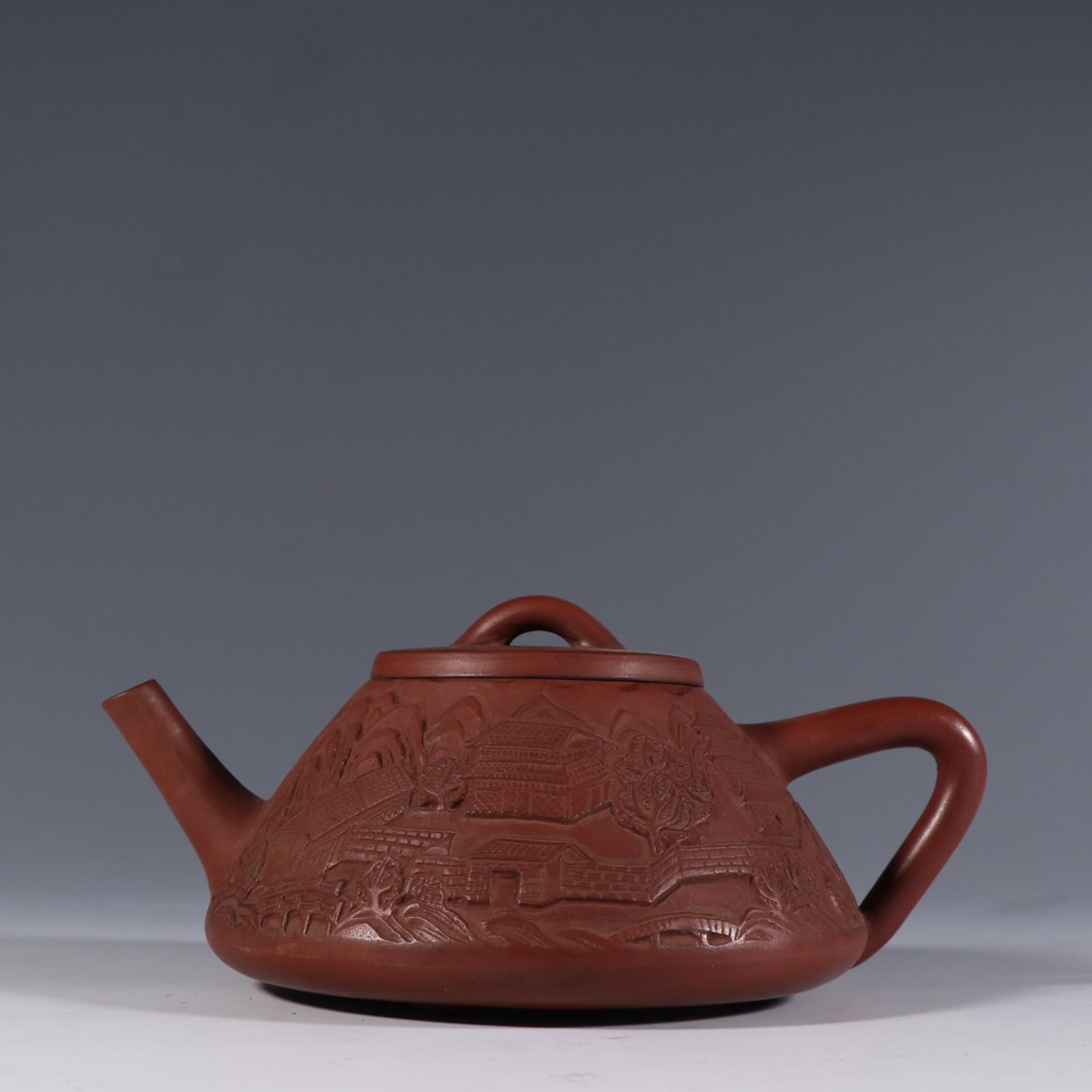 A Rare Purple Sands Landscape Pattern Teapot: A Rare Purple Sands Landscape Pattern Teapot,Qing Dynasty,China,With Mark,Size:3.5inx7in 紫砂山水纹茶壶,中国清代,带款