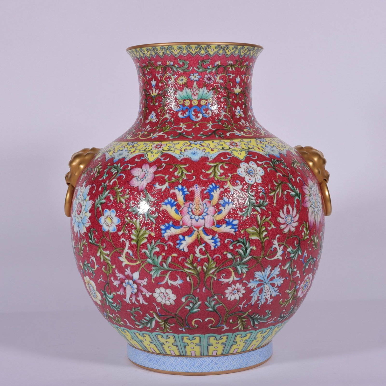 A Rare Famille-Rose Ruby Red-Glazed Lotus Pattern Lion-Ears Vase: A Rare Famille-Rose Ruby Red-Glazed Lotus Pattern Lion-Ears Vase,Qing Dynasty,China,Qianlong Four-character Mark,Size:13.4inx11in 粉彩胭脂红缠枝莲ಬ