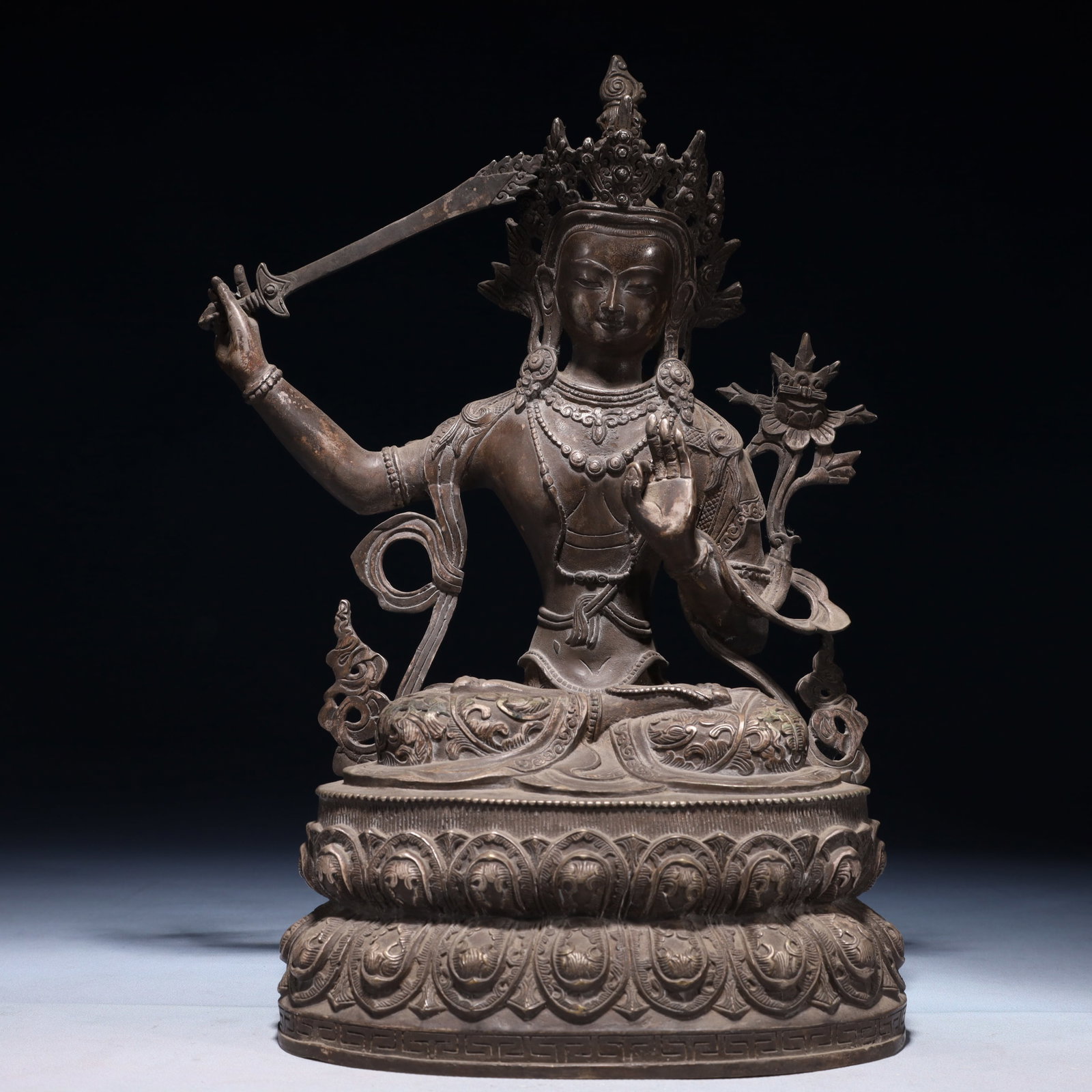 A Solemn Silver-plated Bronze Statue of Manjusri: A Solemn Silver-plated Bronze Statue of Manjusri,Qing Dynasty,China,Size:9.8inx7.1inx14.6in,Weight:3550g 铜镀银文殊菩萨像,中国清ߣ